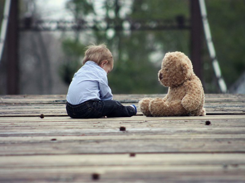 Small Baby sat on a wooden bridge with Teddy Bear. website test